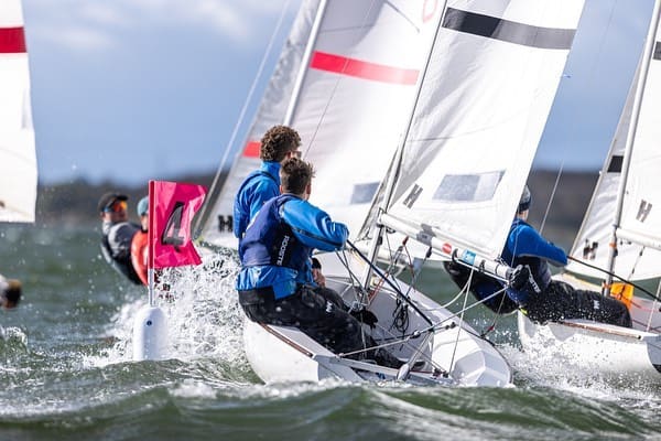 Several firefly dinghies rounding the leeward mark at BUSA 2023