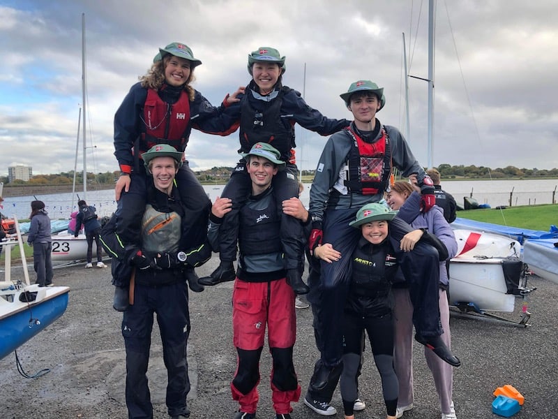 Cambridge Purple team at the 2023 Brummy Boom: three team members have hoisted the other three team members on their shoulders